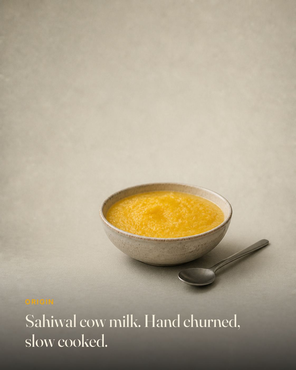 The ingredient behind GetPured A2 Bilona Desi Cow Ghee, photographed on a warm studio backdrop with a caption naming its origin and how it is made