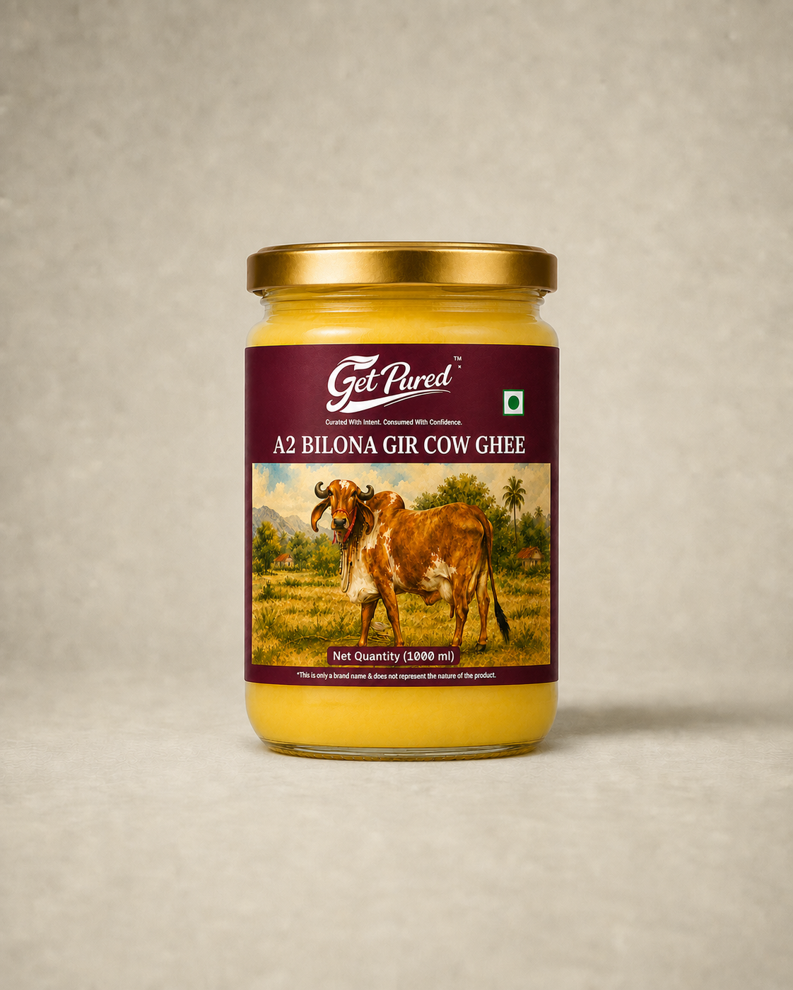 GetPured A2 Bilona Gir Cow Ghee 1000ml pack photographed front on, on a warm studio backdrop