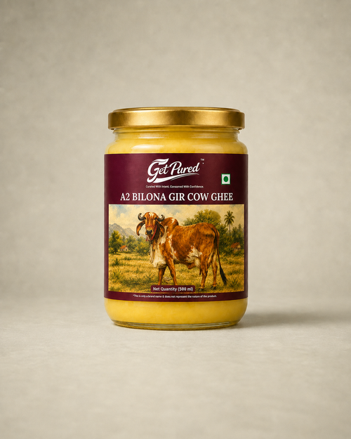 A2 Bilona Gir Cow Ghee 500 ml jar on a warm studio backdrop, made from Gir cow milk by the traditional Bilona method