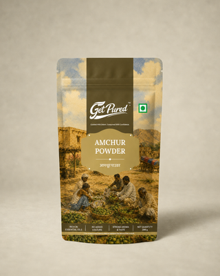 GetPured Amchur Powder 100g pack photographed on a warm studio backdrop