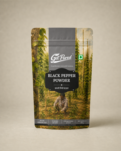 GetPured Black Pepper Powder 100g pack photographed on a warm studio backdrop
