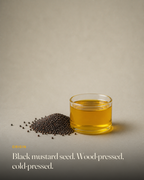 The ingredient behind GetPured Cold Pressed Black Mustard Oil, photographed on a warm studio backdrop with a caption naming its origin and how it is made