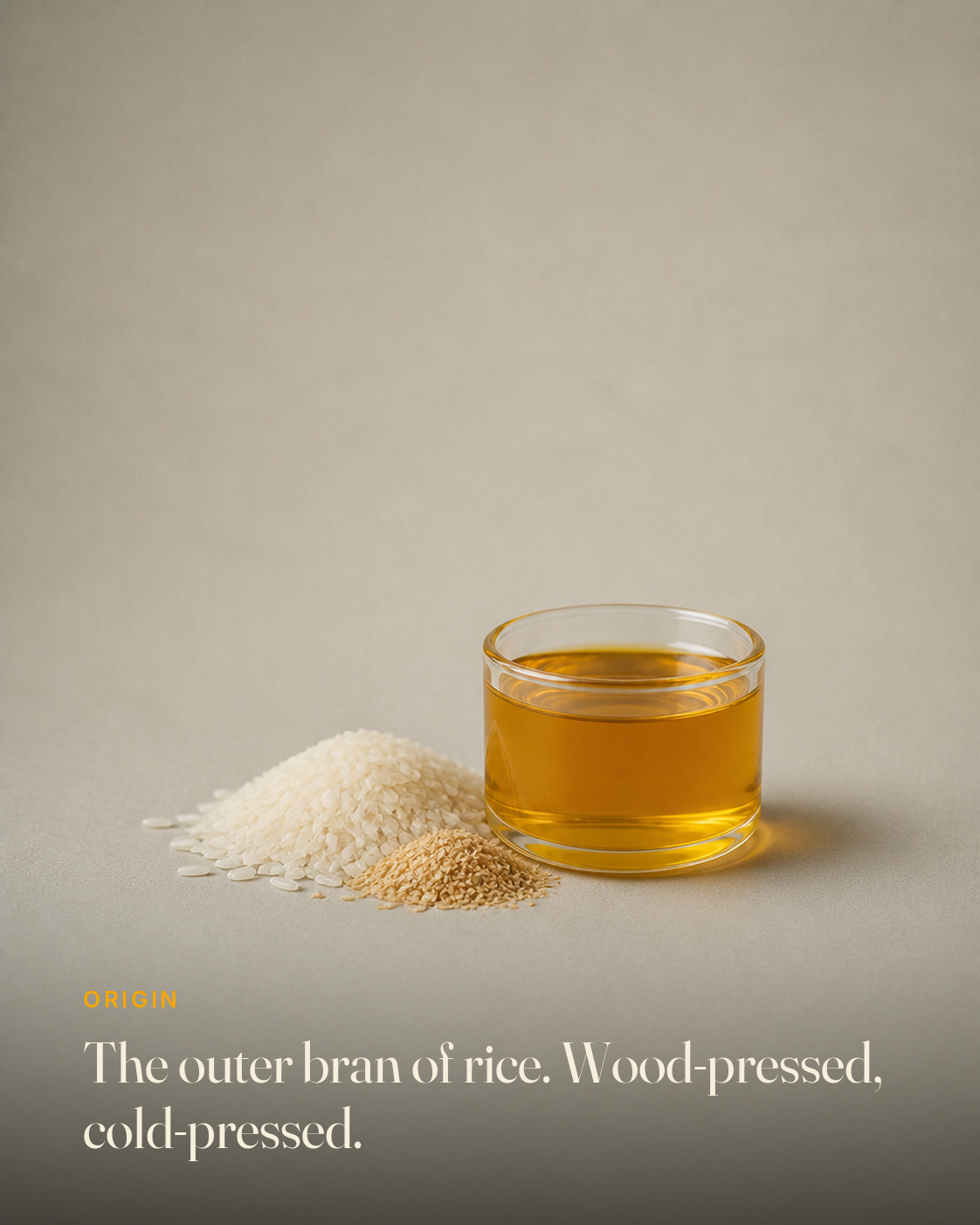 The ingredient behind GetPured Cold Pressed Rice Bran Oil, photographed on a warm studio backdrop with a caption naming its origin and how it is made