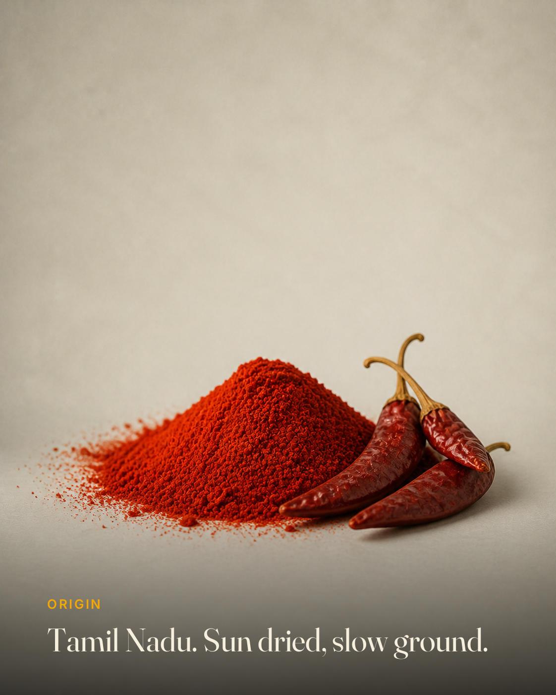 The ingredient behind GetPured Red Chilli Powder, photographed on a warm studio backdrop with a caption naming its origin and how it is made
